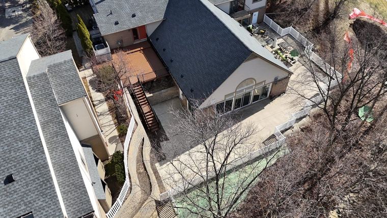 Aerial view of an apartment community during exterior work