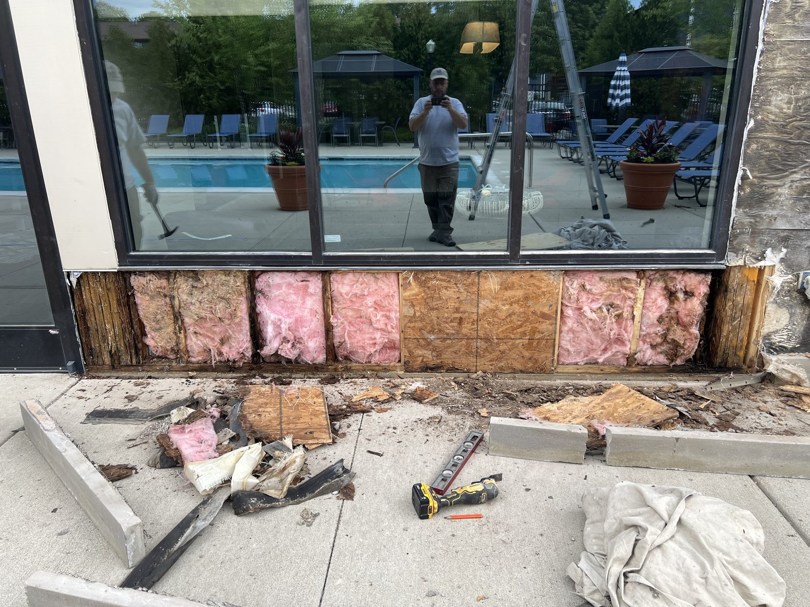 Wall framing and insulation exposed during clubhouse repair