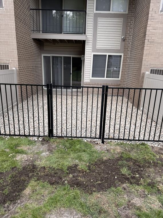 New fencing and grounds work at an apartment community