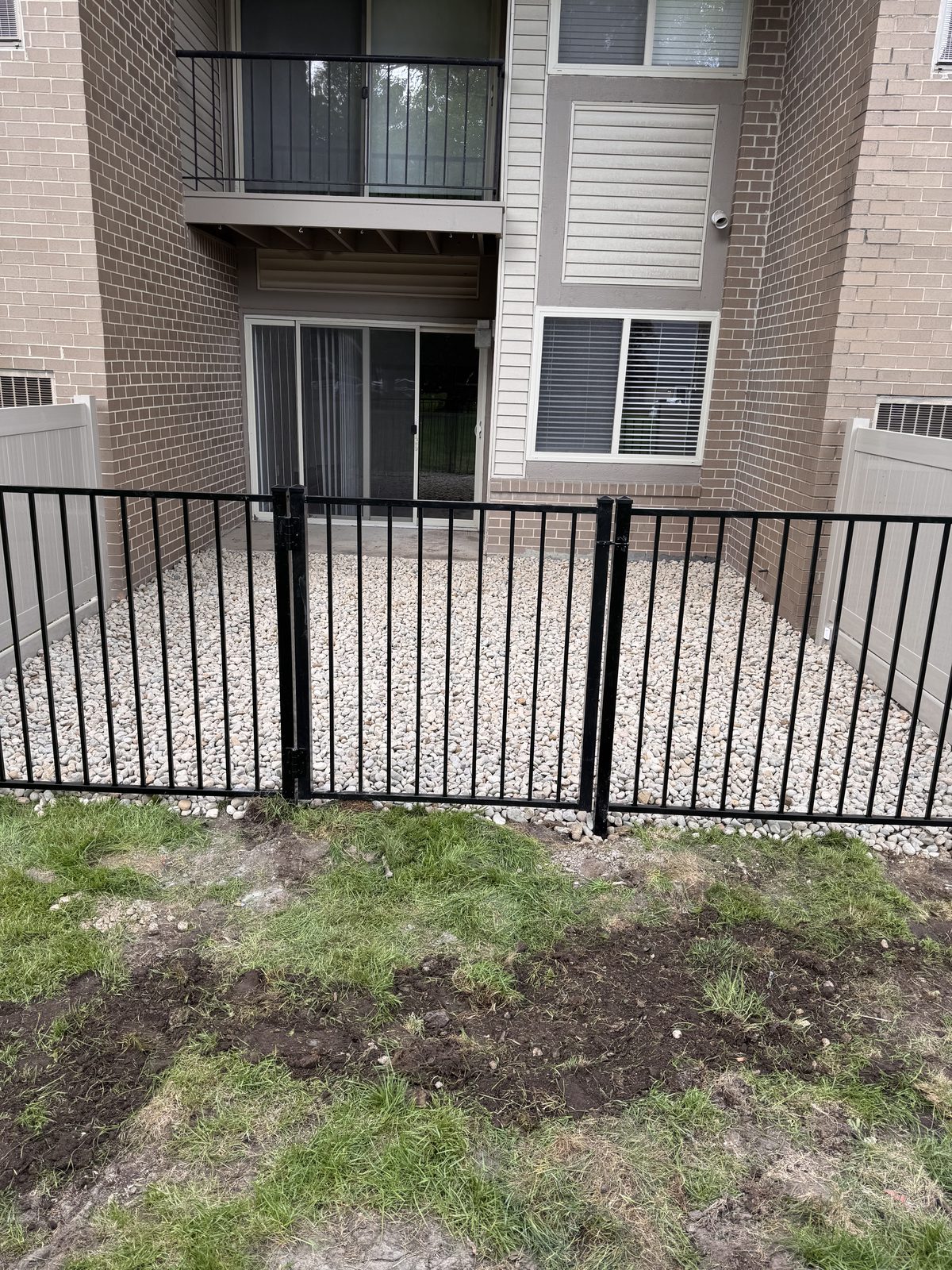New fencing and grounds work at an apartment community
