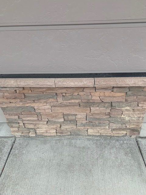 New stone tile and finished floor in a renovated bathroom